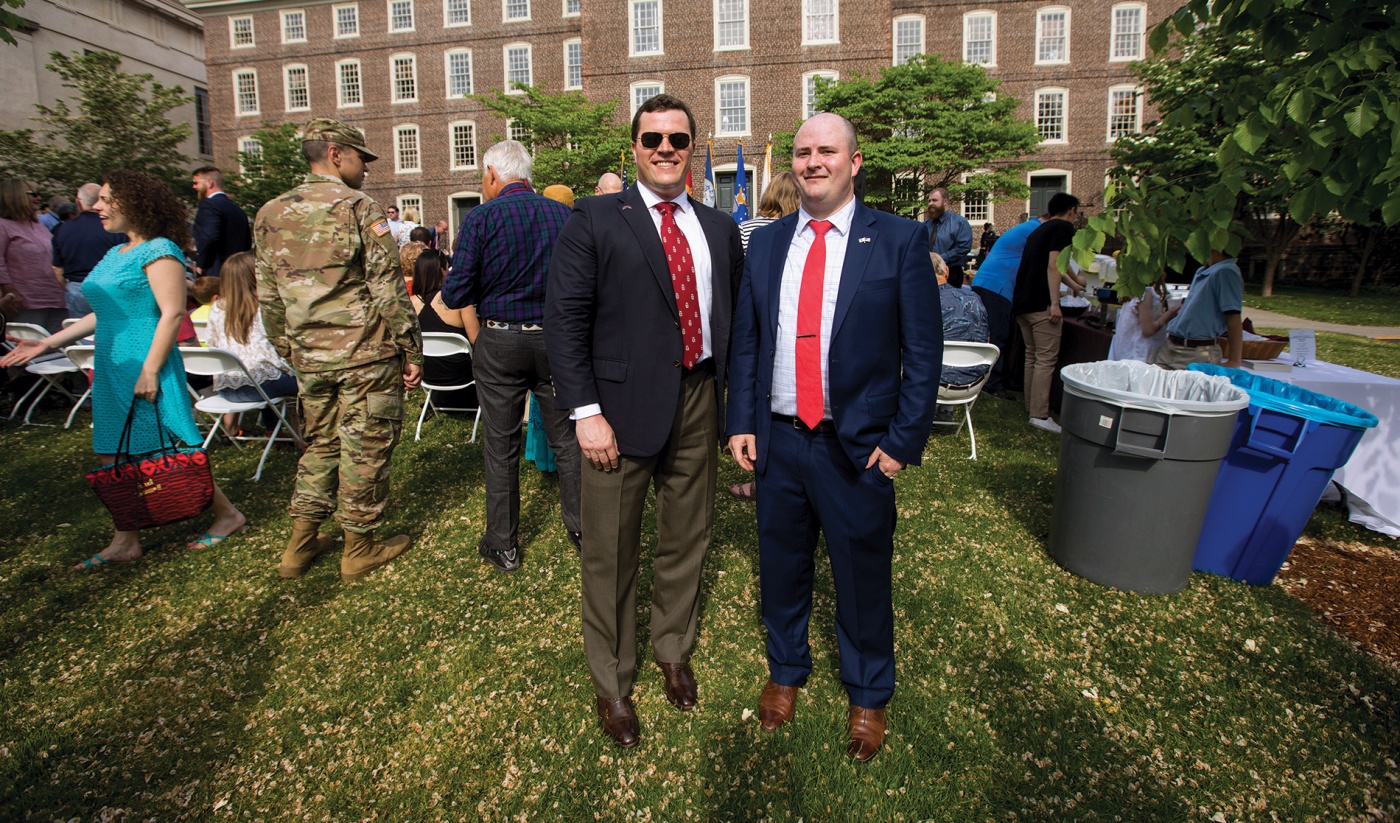 Scott Quigley ’05, mentor, and Davin Lewis ’19, mentee, after the commissioning ceremony.