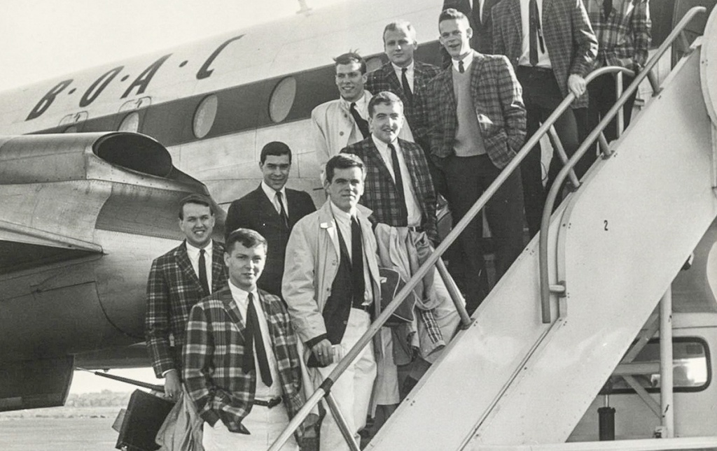 Archival image of the Jabberwocks boarding a plane in 1963.