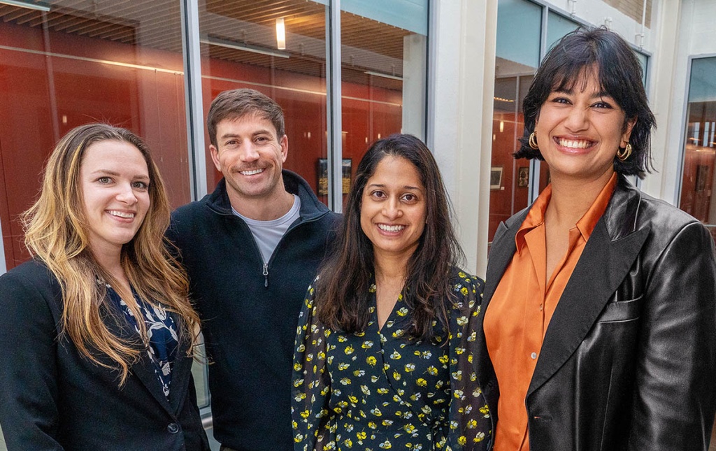 Image of Brown medical students Jess Churchill, Michael Cradeur, Sumana Chintapalli, and Urvi Tiwari inside the Medical School building.