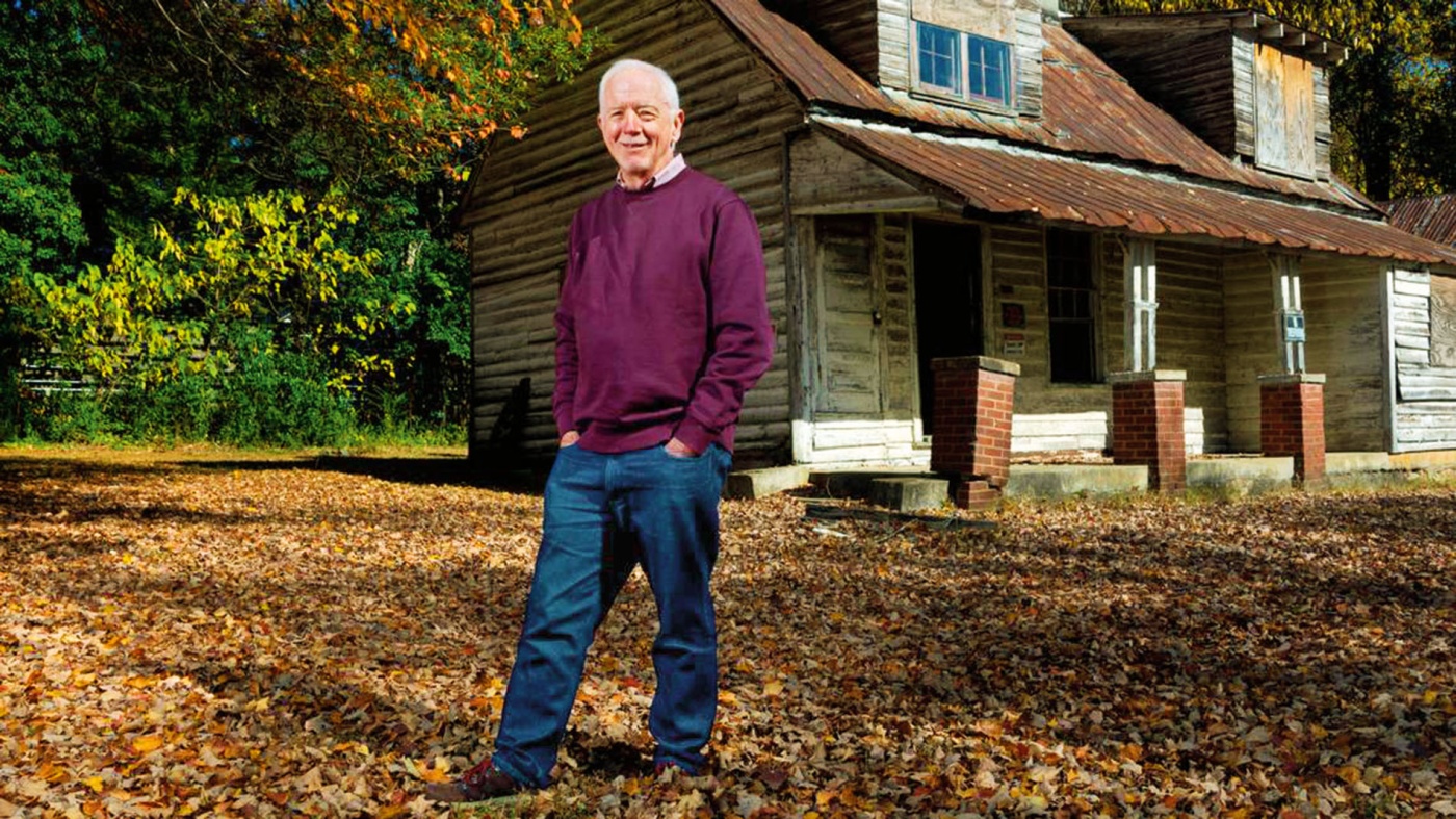 Image of J. Myrick Howard in front of a historic home in N.C.