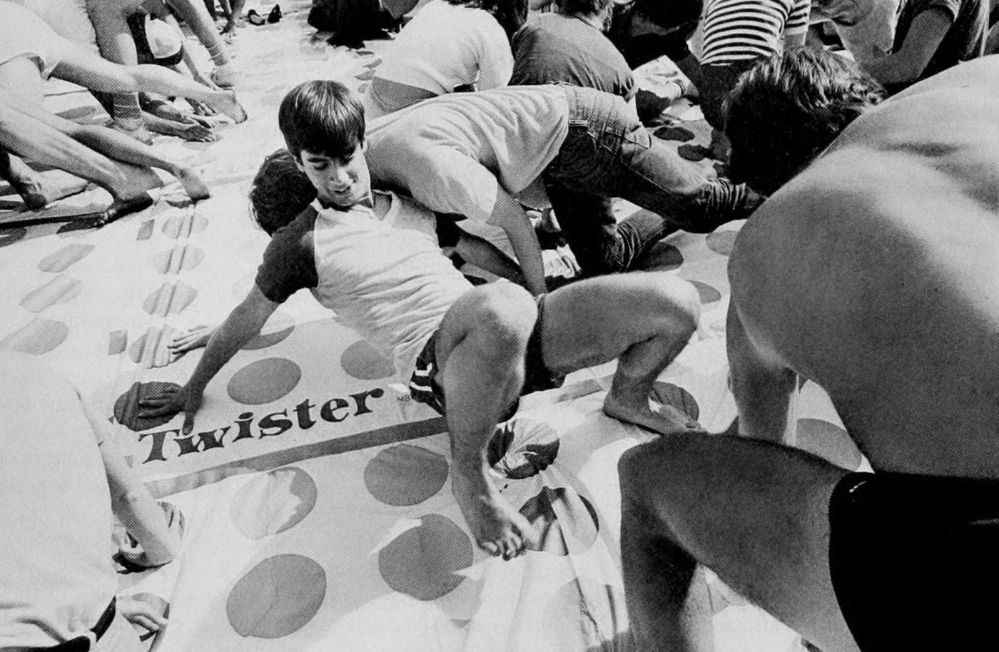 Archival image of students on the Main Green playing a giant game of Twister.