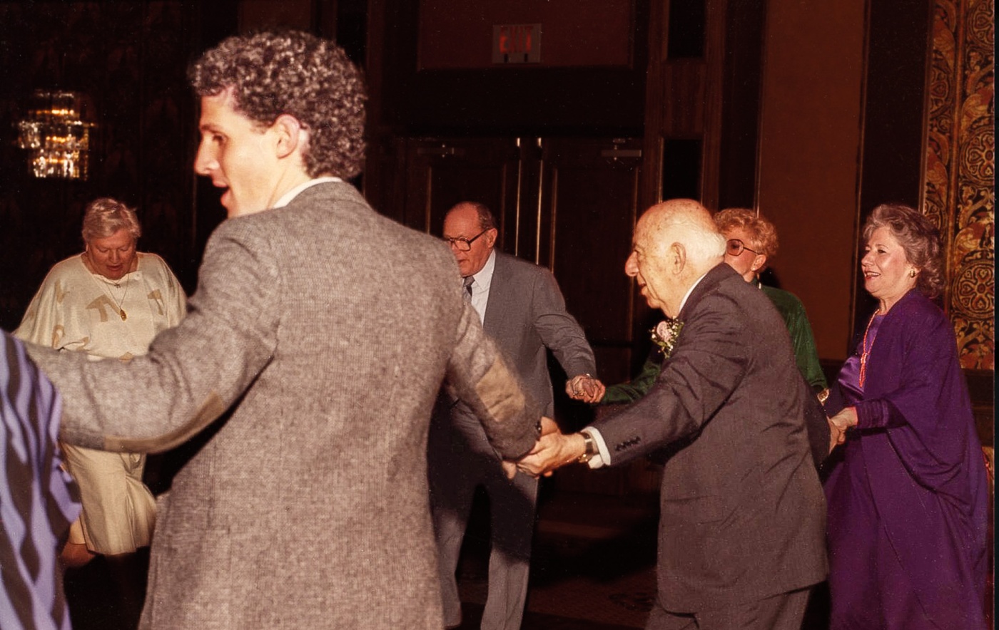 Image of Jeff Bercuvitz dancing the hora at a family celebration in 1986