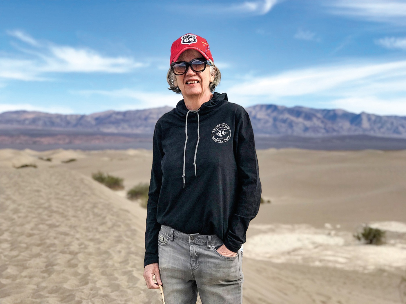 Image of the late Pat Logue standing in the desert.