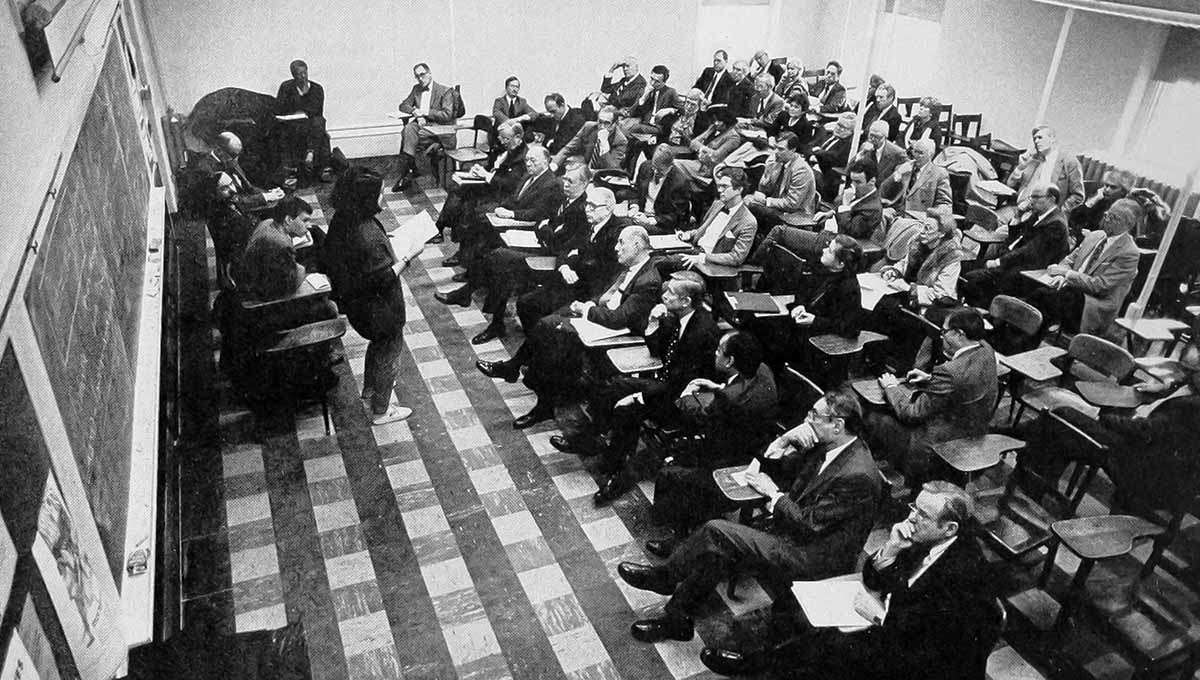 Brown archival image of the Brown Corporation divestment meeting in 1986.