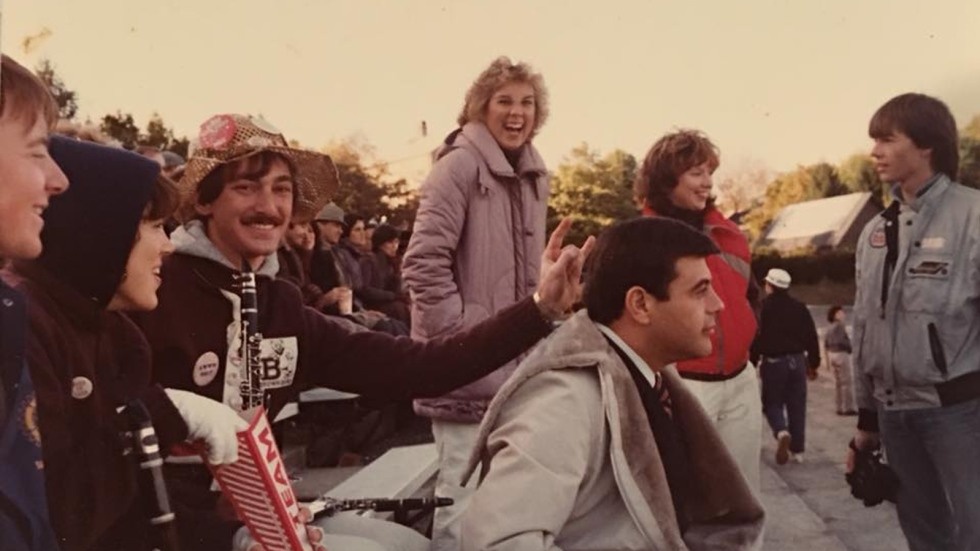 Archival image of Brown Band members giving bunny ears to then-Providence Mayor Buddy Cianci, Jr.