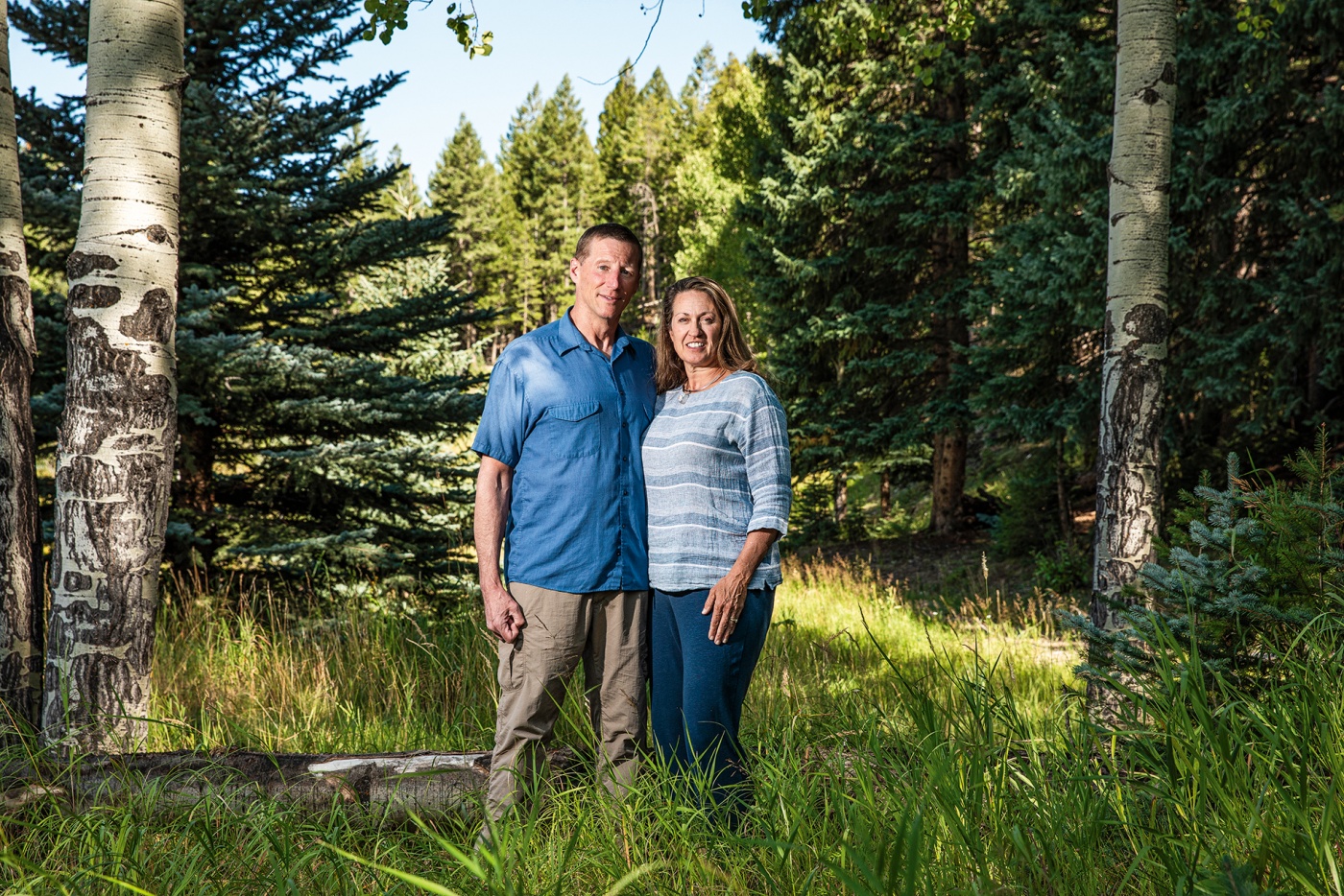 photo of Greg Stiller and his wife in their yard