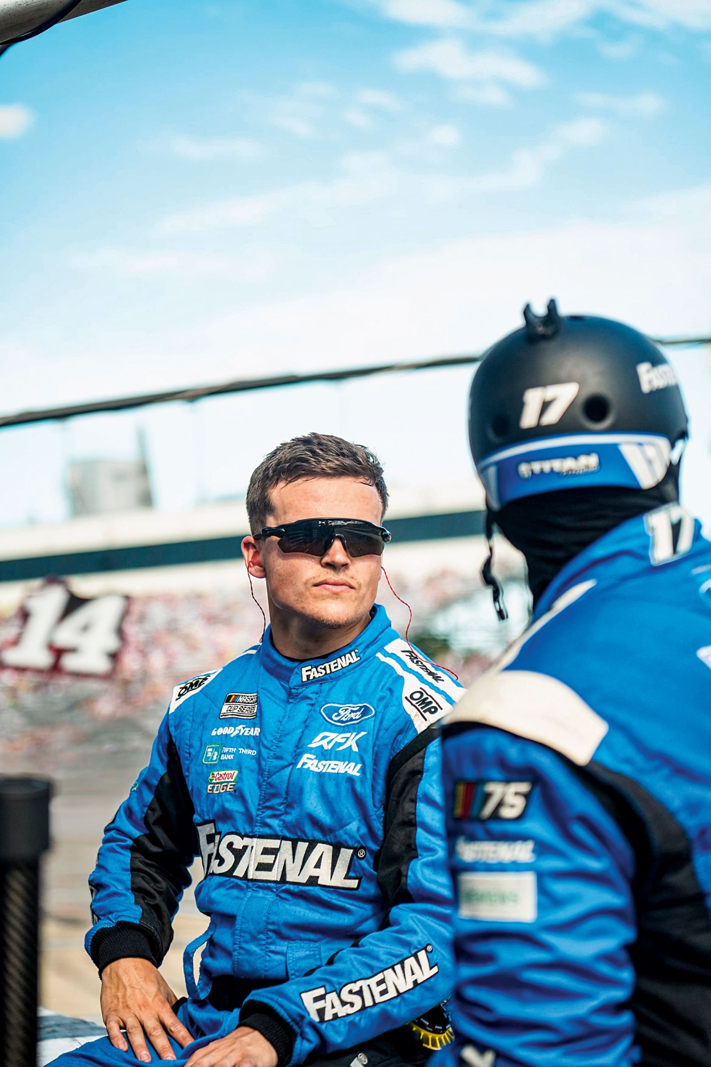 Image of Jakob Prall wearing sunglasses in a racing suit