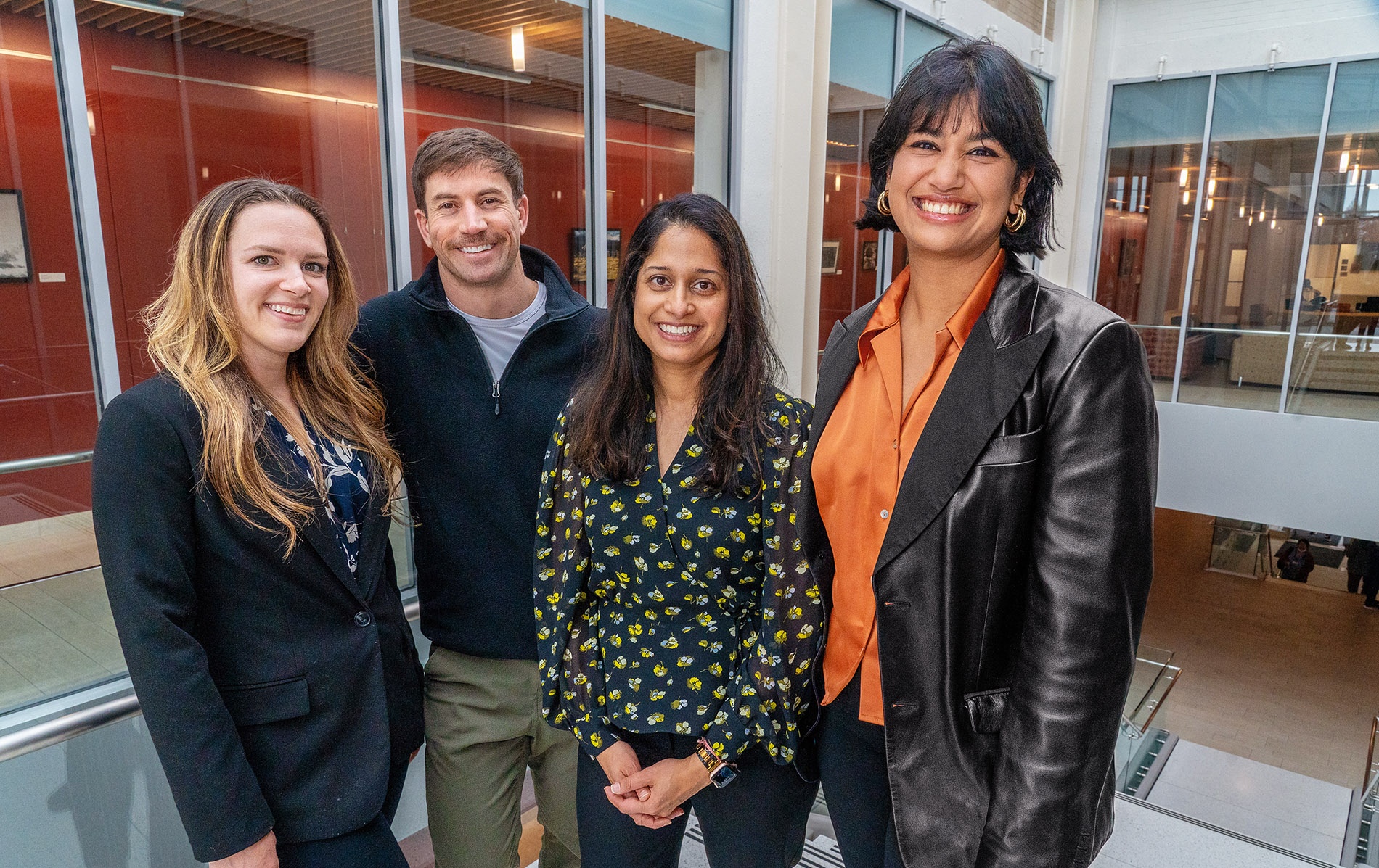 Image of Brown medical students Jess Churchill, Michael Cradeur, Sumana Chintapalli, and Urvi Tiwari inside the Medical School building.