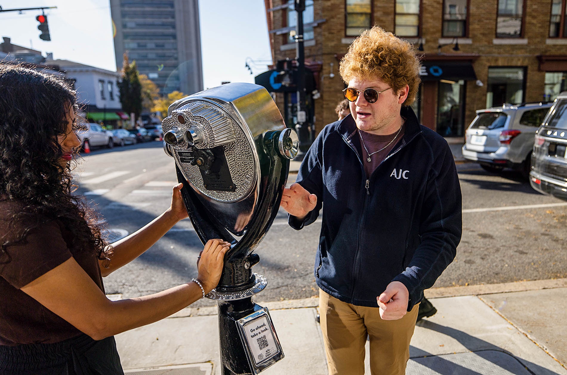 Daniel  Solomon ’26 working on The Blind Urban Subject installation on a Providence street