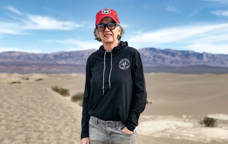 Image of the late Pat Logue standing in the desert.